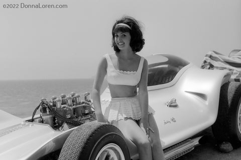 Donna Sitting on Dean Jeffries Custom Car (Bikini Beach 1964)